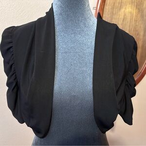 Black shrug